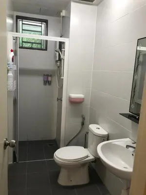 a bathroom with a toilet and a sink and a shower at Taiping Rain Town Homestay\u592a\u5e73\u96e8\u57ce\u540d\u5bbf two car park in Taiping