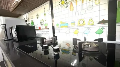 a kitchen with a counter with a sink in it at Taman Bagan Single Storey Terrace House, 9mins to Sunway Carnival Mall, Seberang Jaya in Butterworth