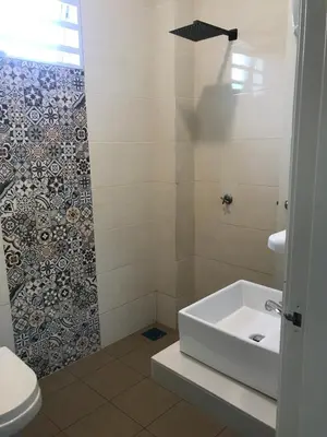 a bathroom with a sink and a shower at As Syifaa Homestay Mslim only in Ipoh