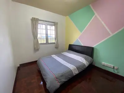 a bedroom with a bed with a striped ceiling and a window at Unicorn Homestay @ Cameron Highland in Tanah Rata