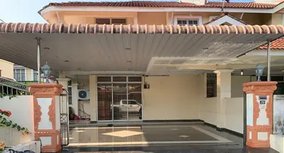 a view of a house with an open door at Awani Homestay Seberang Jaya in Permatang Janggus