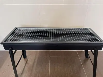 a black ping pong table in a room at Cameron Magpie House in Ringlet