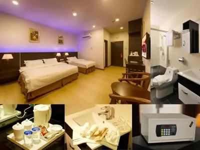 a hotel room with two beds and a bathroom at ERNES Hotel Alma Bukit Mertajam in Bukit Mertajam
