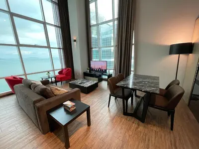 a living room with a couch and a table at Maritime Seaview Hotel by SS Setia Resort in George Town