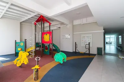 a room with a play area with a playground at Deluxe and Feel like a home 1, 3-6 pax ,Netflix, Georgetown in George Town