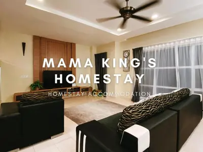 a living room with a ceiling fan and a couch at Mama King's Homestay @ Marina Island in Kampong Batu Gajah