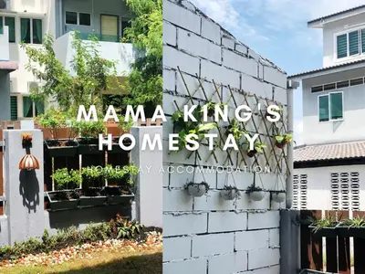 a house with a sign that says manama kings homestead at Mama King's Homestay @ Marina Island in Kampong Batu Gajah