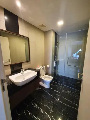 a bathroom with a sink and a toilet and a shower at Landmark By Katana 3BR Glamorous Highrise Seaview Homestay Gurney\u65e0\u654c\u6d77\u666f\u4e09\u623f\u5957\u623f in Tanjong Tokong