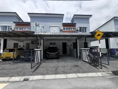 a car parked in the garage of a house at LYNN HOMESTAY SERI ISKANDAR in Seri Iskandar