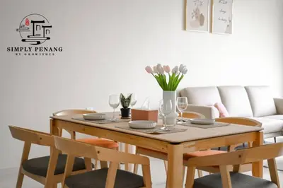 a dining room with a table and chairs at Beacon Executive Suites by Simply Penang in George Town