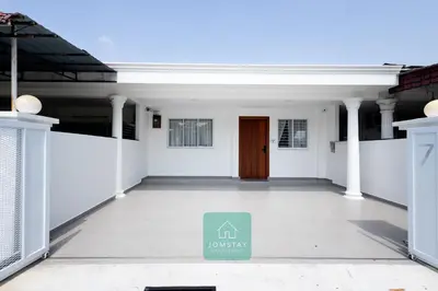 a view of the inside of a white house at Jomstay MUJI 19 & 7 INN Ipoh Garden 8-10 pax in Ipoh
