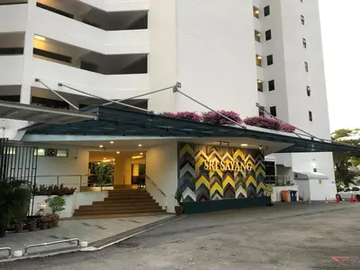 a building with a mural on the front of it at Beach Resort HOME STAY SRI SAYANG 05 APARTMENT BATU FERRINGHI 2BEDROOM in Batu Ferringhi