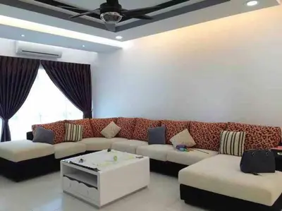 a living room with a couch and a table at Shuang Yang Sekinchan Homestay 3 in Sekincan
