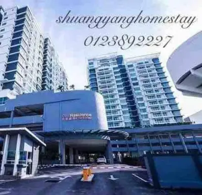 a view of a building with tall buildings at Shuang Yang Sekinchan Homestay 3 in Sekincan