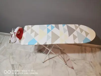a skateboard on a stand on top of a counter at TB HOMESTAY Tasek klebang(taman bertuah) 10pax wifi in Chemor