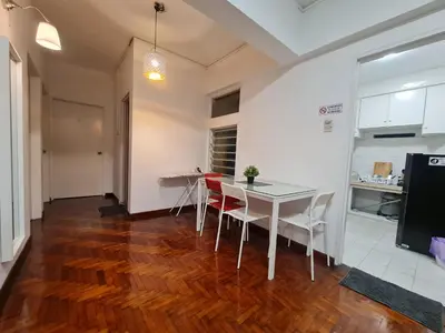 a kitchen and dining room with a table and chairs at JJ Home @ Jalan Burmah, Georgetown in George Town