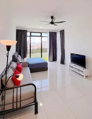 a living room with a couch and a flat screen tv at 2BR Georgetown Luxury Suite #RoofTopPool #Beacon in George Town