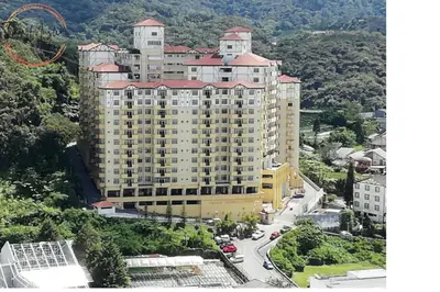 a large building on the side of a road at Tiara Homestay 2 with 3 Bedroom, Unlimited Wifi - Brinchang in Brinchang