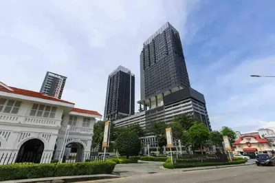 a tall building in the middle of a city at Tropicana 218 Macalister Water Purifier High Floor in George Town