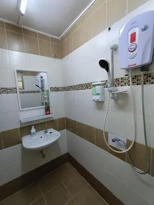 a bathroom with a sink and a shower at Dream 2 in Cameron Highlands