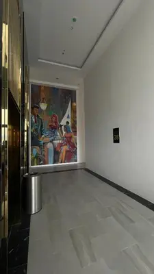 a room with a large painting on the wall at New Georgetown Stylist 2BR Homestay for 10pax \u65e0\u654c\u7f8e\u666f\u4e24\u623f\u6c11\u5bbf Beacon Executive Suite in George Town