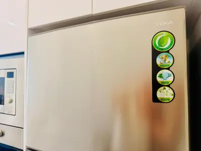 a refrigerator with a bunch of stickers on it at New Georgetown Stylist 2BR Homestay for 10pax \u65e0\u654c\u7f8e\u666f\u4e24\u623f\u6c11\u5bbf Beacon Executive Suite in George Town