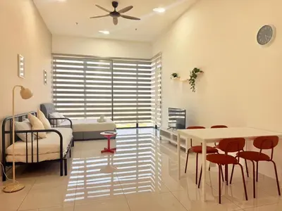 a hospital room with a bed and a table and chairs at N New Georgetown Instagramable 2BR Homestay for 10pax \u65e0\u654c\u7f8e\u666f\u4e24\u623f\u6c11\u5bbf Beacon Executive Suite in George Town
