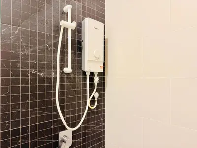 a shower in a bathroom with black tiles at New Georgetown Modern City View 2BR Homestay for 10pax \u65e0\u654c\u7f8e\u666f\u4e24\u623f\u6c11\u5bbf Beacon Executive Suite in George Town