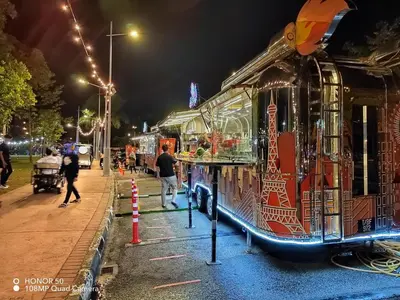 a food truck parked on a street at night at Adelea Homestay MERU in Ipoh