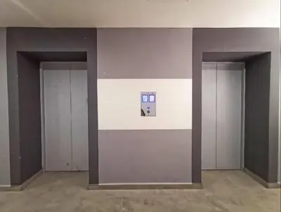 an empty room with two doors and a picture on the wall at The Venus Sri Manjung Block B High Floor in Seri Manjung