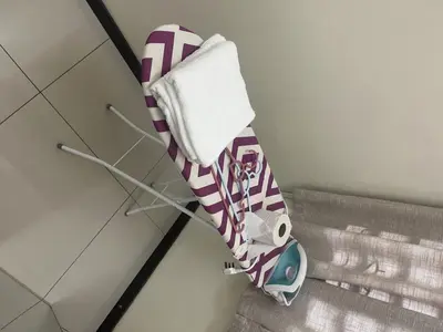 a towel hanging on a rack in a bathroom at LOW SEASON PROMOTION! Mountainview Corner Lot 10 pax in Ipoh
