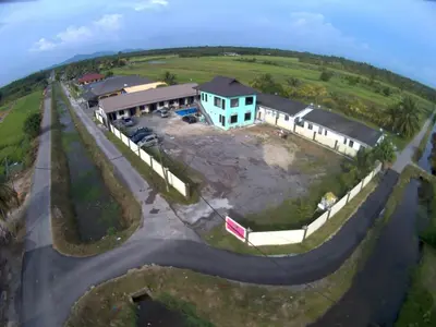 an aerial view of a house on a hill at MAMA homestay in Bagan Serai