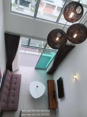 an overhead view of a living room with chairs and lights at W5WarmStay@Golden Hill/Penthouse/WiFi/3R/NightMarket/2CarPark in Brinchang