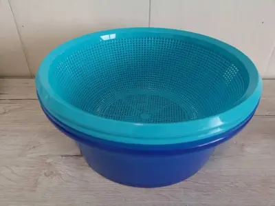 a blue basket sitting on top of a wooden floor at W36 WarmStay atGoldenHills NightMarket 4R Wifi BBQ in Brinchang