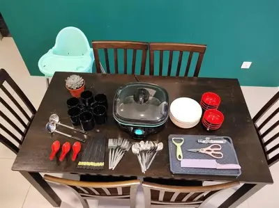 a table with utensils on top of it at W39C WarmStay atGoldenHill NightMarket 2R WiFi CarPark in Brinchang