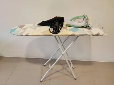 a table with a surfboard on top of it at W39C WarmStay atGoldenHill NightMarket 2R WiFi CarPark in Brinchang