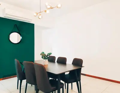 a dining room with a table and chairs at The Landmark by Katana 3BR to 4BR Luxury Seaview Landmark Homestay at Gurney 15-16pax \u65e0\u654c\u6d77\u666f\u5957\u623f in Tanjong Tokong