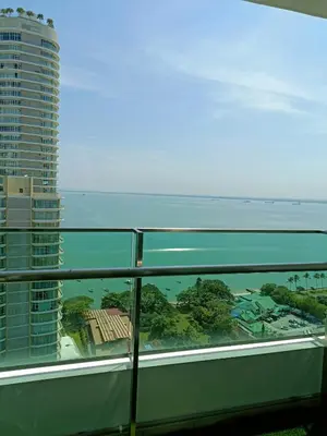 a view of the ocean from a balcony of a building at Mansion One 3 Bedroom SEAVIEW Gurney Georgetown 1-13Pax in George Town