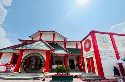 a building with an arch in front of it at Kejora Garden Resort Pulau Pangkor in Pasir Bogak