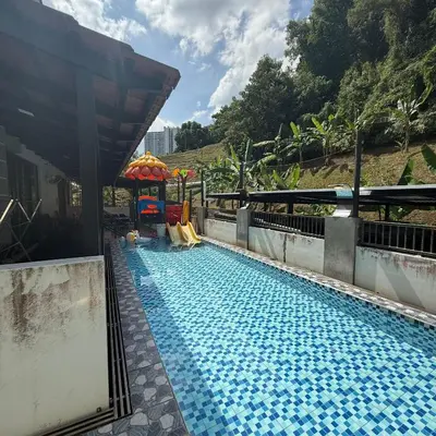 a swimming pool at a resort with a playground at 30PAX 7BR Villa with Kids Swimming pool, KTV, Pool Table n BBQ near SPICE Arena Penang 9800 SQFT in Bayan Lepas