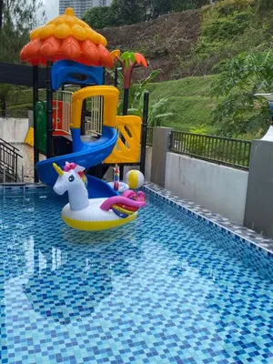 a swimming pool with at 40 PAX 9BR Villa with Kids swimming Pool, KTV, BBQ n Pool Tables near SPICE Arena Penang 9800 SQFT in Bayan Lepas