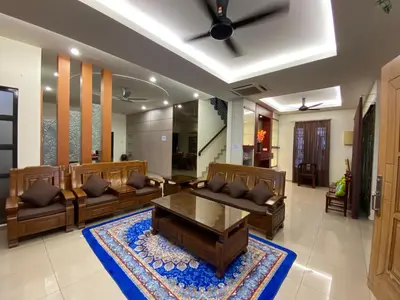 a living room with couches and a table and a rug at 40 PAX 9BR Villa with Kids swimming Pool, KTV, BBQ n Pool Tables near SPICE Arena Penang 9800 SQFT in Bayan Lepas