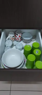 a drawer full of dishes and plates and bowls at Cameron 3room Golden Hills in Brinchang