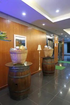 two baskets sitting on top of barrels in a room at Rustic one bedroom unit for 4pax by Jomy Management in Lumut