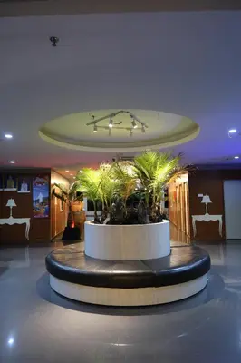 a room with a large exhibit with plants in it at Rustic one bedroom unit for 4pax by Jomy Management in Lumut