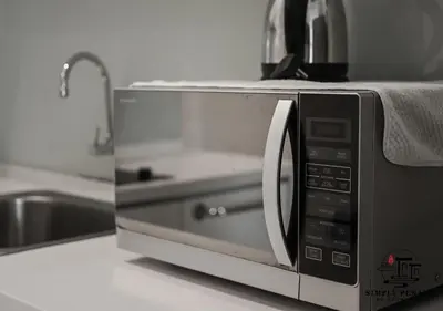 a microwave oven sitting on top of a counter at Mansion One by Simply Penang in George Town