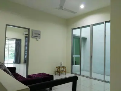 a living room with a couch and a window at Fong's Ipoh SImpang Pulai Homestay in Ipoh