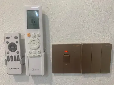 a nintendo wii game system with a controller and a box at Queen Room Semi Attached Bathroom Bukit Mertajam Alma Impian in Bukit Mertajam