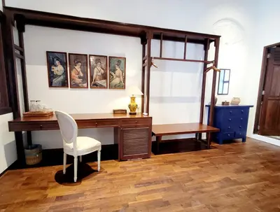 an office with a desk and a white chair at East Indies Mansion in George Town
