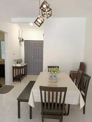 a dining room with a table and chairs at Dream 3 @ Emerald avenue in Brinchang